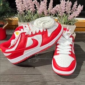 Nike Dunk Low USC.  Red and White Sneakers
